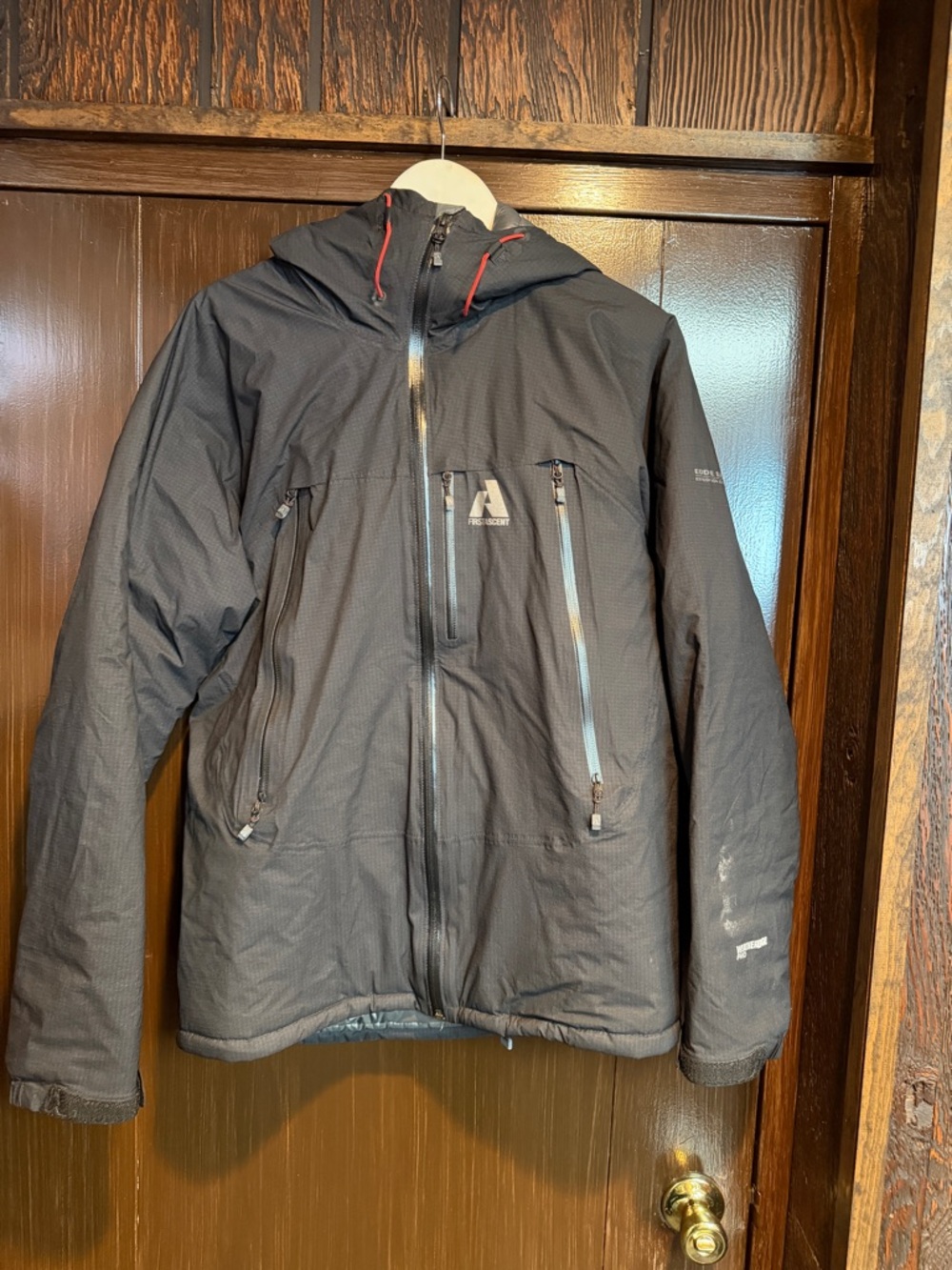 Eddie Bauer Black Hooded Ski Jacket with Red Drawcord Accents